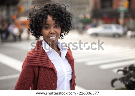 https://thumb10.shutterstock.com/display_pic_with_logo/1051921/226806577/stock-photo-young-african-american-black-woman-in-new-york-city-smile-happy-face-portrait-226806577.jpg