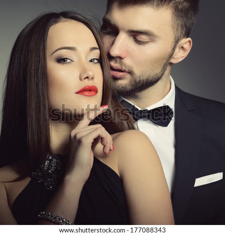 https://thumb10.shutterstock.com/display_pic_with_logo/111616/177088343/stock-photo-sexy-passion-couple-in-love-portrait-of-beautiful-young-man-and-woman-dressed-in-classic-clothes-177088343.jpg