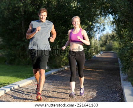 https://thumb10.shutterstock.com/display_pic_with_logo/123808/221641183/stock-photo-happy-couple-running-on-a-trail-outside-221641183.jpg