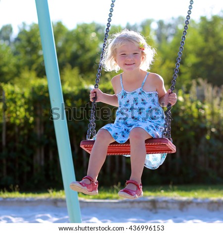 Happy Little Girl Smiling On Swing Stock Photo 82573807 - Shutterstock