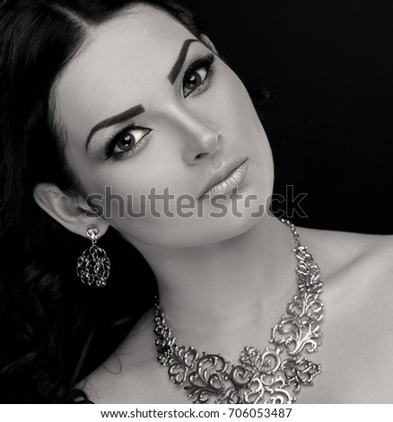 https://thumb10.shutterstock.com/display_pic_with_logo/1345723/706053487/stock-photo-amazing-portrait-eastern-woman-face-has-big-fairy-eyes-beautiful-brunette-hair-sexy-lips-long-706053487.jpg