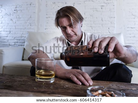 stock-photo-sad-depressed-alcoholic-busi