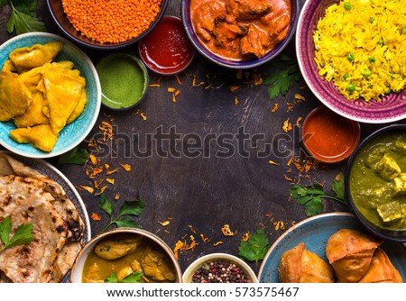 Assorted Indian Food On Dark Wooden Stock Photo 573575512 