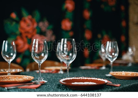 Wine Glasses And Table Serving In Rustic Style Restaurant Wine Glasses And Table Serving In Rustic Style Restaurant