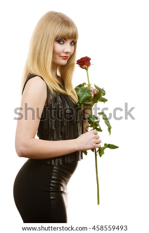 https://thumb10.shutterstock.com/display_pic_with_logo/175351/458559493/stock-photo-woman-holding-rose-flower-attractive-blonde-lady-dark-makeup-evening-black-dress-studio-shot-458559493.jpg