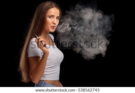 Beautiful woman smoking cigarette Beautiful woman smoking cigarette