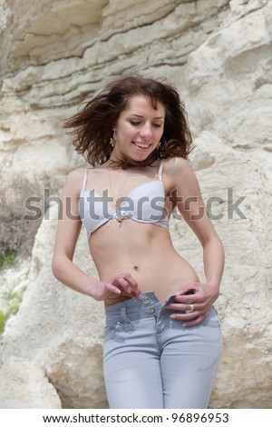 Dark Haired Girl Exposes Her Desirable Body