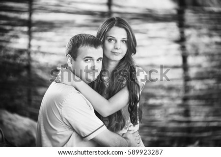 https://thumb10.shutterstock.com/display_pic_with_logo/2166533/589923287/stock-photo-beautiful-couple-in-love-boy-and-girl-with-long-hair-hugging-look-in-frame-of-love-relationships-589923287.jpg