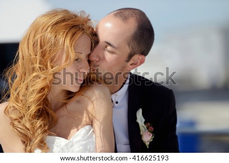 https://thumb10.shutterstock.com/display_pic_with_logo/2302709/416625193/stock-photo-wedding-couple-is-hugging-on-a-yacht-beauty-bride-with-groom-beautiful-model-girl-in-white-dress-416625193.jpg