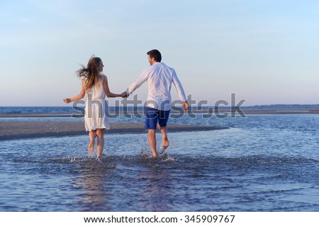 https://thumb10.shutterstock.com/display_pic_with_logo/2345066/345909767/stock-photo-beautiful-couple-on-the-beach-345909767.jpg