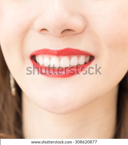 https://thumb10.shutterstock.com/display_pic_with_logo/2415443/308620877/stock-photo-woman-smile-308620877.jpg