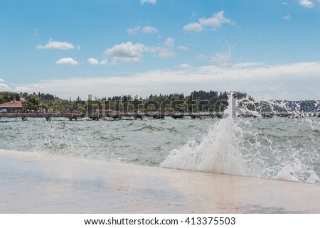 boardwalk footpath rustic snow through seaside promenade crashing waves against sky shutterstock