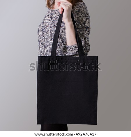 Download Mockup Girl Holding Blank Cotton Tote Stock Photo ...