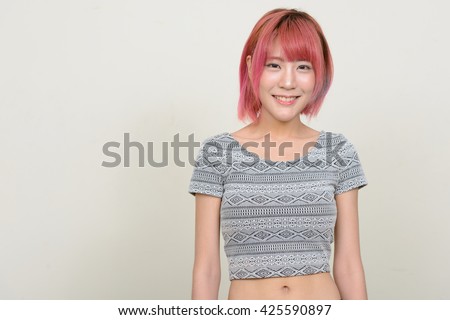 https://thumb10.shutterstock.com/display_pic_with_logo/3175751/425590897/stock-photo-asian-woman-pink-hair-smiling-425590897.jpg