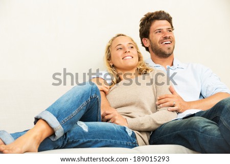 https://thumb10.shutterstock.com/display_pic_with_logo/322021/189015293/stock-photo-happy-young-couple-at-home-relaxing-on-the-sofa-189015293.jpg