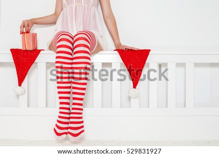 sexy woman in lingerie and sexy santa stockings with gifts and christmas caps xmas - Santa Stockings sexy woman in lingerie and sexy santa stockings with gifts and christmas caps xmas - Santa Stockings