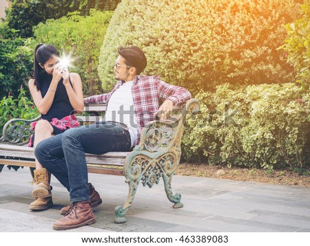 https://thumb10.shutterstock.com/display_pic_with_logo/3292274/463389083/stock-photo-young-couple-spending-time-together-in-the-park-in-summer-sunny-day-taking-photo-of-each-other-463389083.jpg