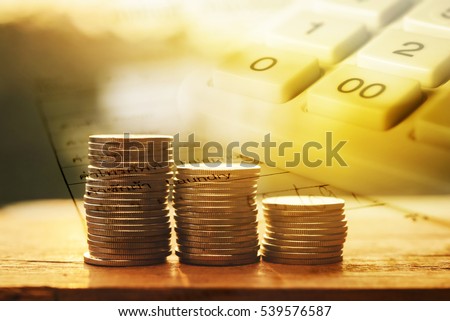 stock photo double exposure hand with stack of coins and utility bill and calculator with account banking for 539576587
