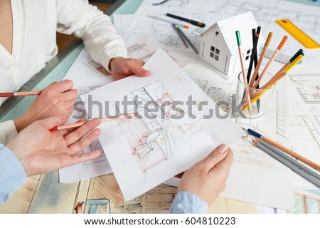 Interior Designers At Work interior designer works on hand drawing stock photo 135392435 Interior Designers At Work interior designer works on hand drawing stock photo 135392435