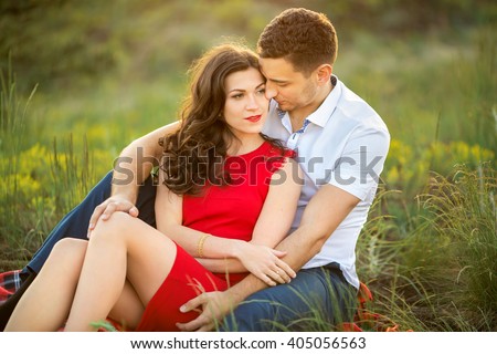 https://thumb10.shutterstock.com/display_pic_with_logo/352135/405056563/stock-photo-beautiful-young-couple-relaxing-in-park-happy-family-outdoor-smiling-man-and-woman-relationships-405056563.jpg