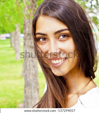 https://thumb10.shutterstock.com/display_pic_with_logo/360472/137294057/stock-photo-summer-spring-woman-smiling-happy-sitting-in-white-dress-in-sunny-park-beautiful-mixed-ethnic-137294057.jpg
