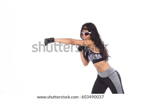 https://thumb10.shutterstock.com/display_pic_with_logo/3949610/603490037/stock-photo-tan-skin-asian-fitness-girl-in-gray-camouflage-sport-bra-black-spandex-pants-stud-gloves-and-603490037.jpg