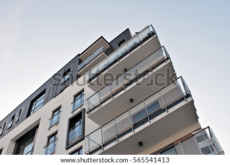 Facade Modern Apartment Building Stock Photo 565537990 - Shutterstock  Facade of a modern apartment building