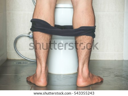 a man peeing in toilet self blowjob video