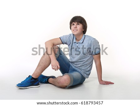 Casual Young Man Sitting On Floor Stock Photo 114716212 - Shutterstock