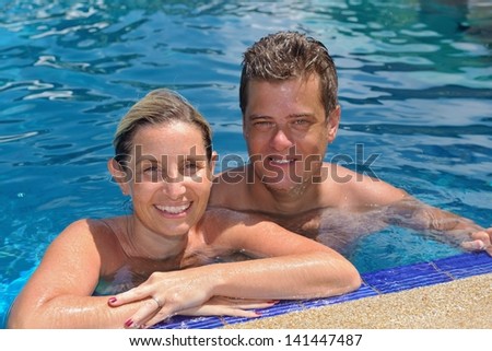 https://thumb10.shutterstock.com/display_pic_with_logo/54809/141447487/stock-photo-happy-young-couple-at-summer-vacation-have-fun-and-relax-at-beautiful-sunny-day-on-beach-141447487.jpg