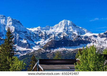Swiss Mountain House beautiful swiss mountain valley landscape house stock photo Swiss Mountain House beautiful swiss mountain valley landscape house stock photo
