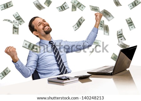 stock-photo-young-modern-businessman-excited-with-his-success-while-working-with-his-laptop-computer-with-money-140248213.jpg