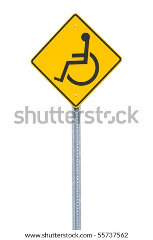 A yellow handicapped sign - stock photo