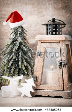 symbol hase japan cones on lantern Christmas wooden with old fir and card candle