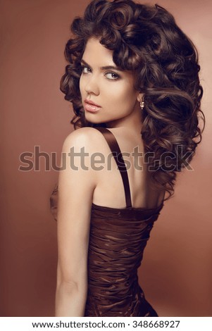 https://thumb10.shutterstock.com/display_pic_with_logo/662170/348668927/stock-photo-healthy-curly-hair-beauty-brunette-beautiful-young-woman-with-long-curly-hairstyle-elegant-lady-348668927.jpg