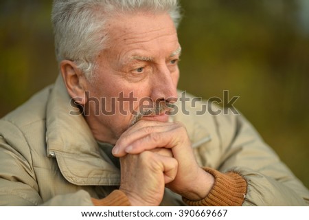 https://thumb10.shutterstock.com/display_pic_with_logo/674632/390669667/stock-photo-thoughtful-senior-man-in-park-390669667.jpg