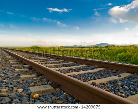 train speeding through irish village in the afternoon sunlight train 