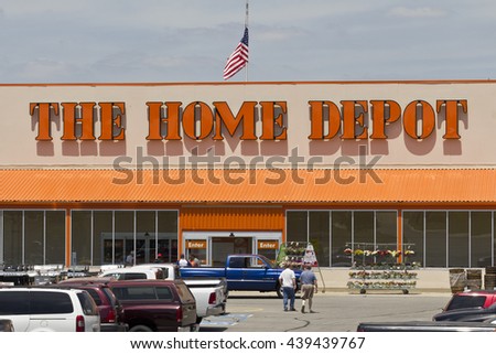 Customers enter a Home Depot store in Cary, North Carolina ...