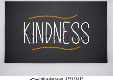 The word kindness written on big blackboard - stock photo