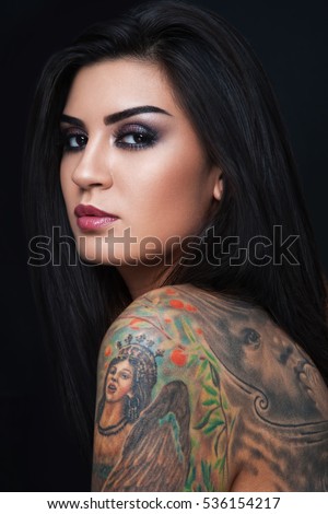 https://thumb10.shutterstock.com/display_pic_with_logo/78251/536154217/stock-photo-portrait-of-young-beautiful-sexy-woman-with-gorgeous-tattoo-on-her-body-536154217.jpg