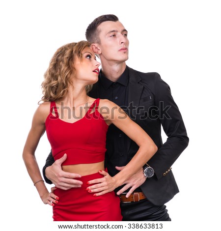 https://thumb10.shutterstock.com/display_pic_with_logo/78977/338633813/stock-photo-young-elegant-loving-couple-portrait-woman-in-red-dress-and-man-in-black-suit-isolated-on-white-338633813.jpg