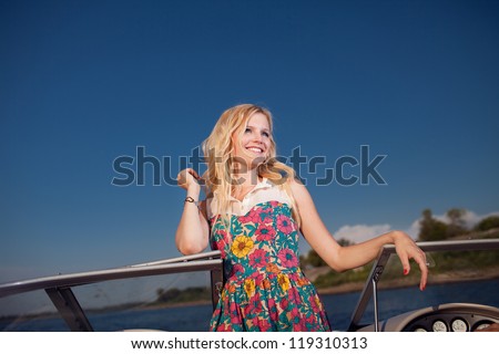 https://thumb10.shutterstock.com/display_pic_with_logo/81001/119310313/stock-photo-young-blonde-girl-on-the-yacht-119310313.jpg