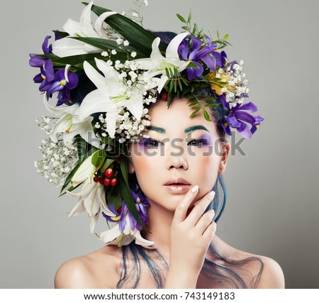 https://thumb10.shutterstock.com/display_pic_with_logo/813691/743149183/stock-photo-young-cute-asian-model-woman-with-blossom-flower-hairstyle-and-perfect-makeup-nice-girl-with-lily-743149183.jpg
