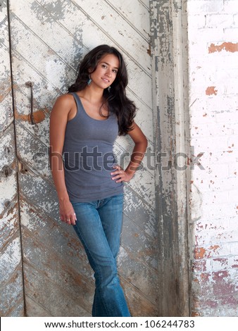 https://thumb10.shutterstock.com/display_pic_with_logo/816/106244783/stock-photo-very-pretty-young-native-american-woman-in-front-of-a-rustic-door-with-her-hand-on-hip-106244783.jpg