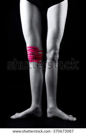 feet gymnast beam balance taping reducing knee pain medical shutterstock