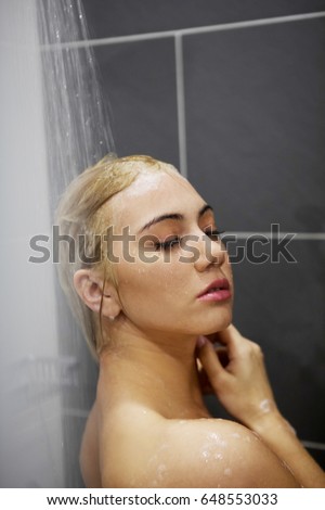 Beautiful Young Woman Taking A Shower Stock Photo 
