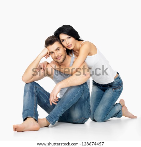 https://thumb10.shutterstock.com/display_pic_with_logo/93178/128674457/stock-photo-beautiful-happy-couple-in-love-on-white-background-dressed-in-blue-jeans-and-white-undershirt-128674457.jpg