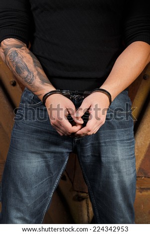 tattooed hands criminal handcuffed rear view stock photo 408021142 tattooed hands criminal handcuffed rear view stock photo 408021142
