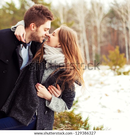 https://thumb10.shutterstock.com/display_pic_with_logo/952708/129386327/stock-photo-portrait-of-happy-couple-at-winter-resort-129386327.jpg