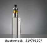 stock-photo-electronic-cigarette-over-a-gray-background-519795307.jpg